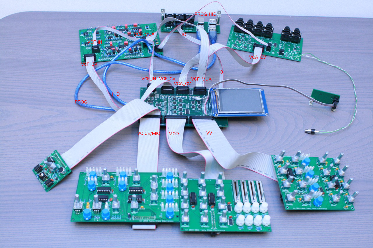 ST4 boards all hooked up. Most connections have their name in red. Don't mix up VCF_MUX and VCA_CV ! The IO connection goes to the IDC6 socket on the bottom of the EXP board.
