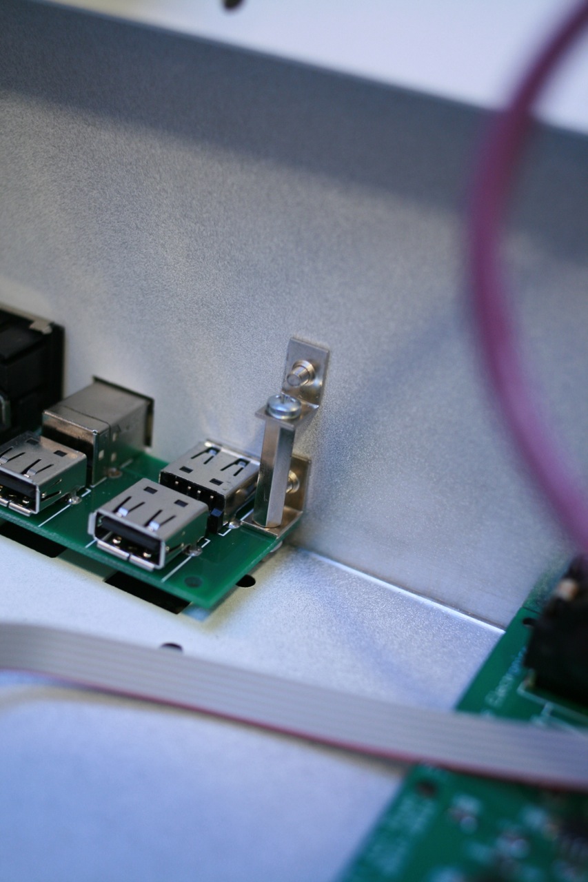 IO board configured for desktop mount. This means it's fastened against the back plate.