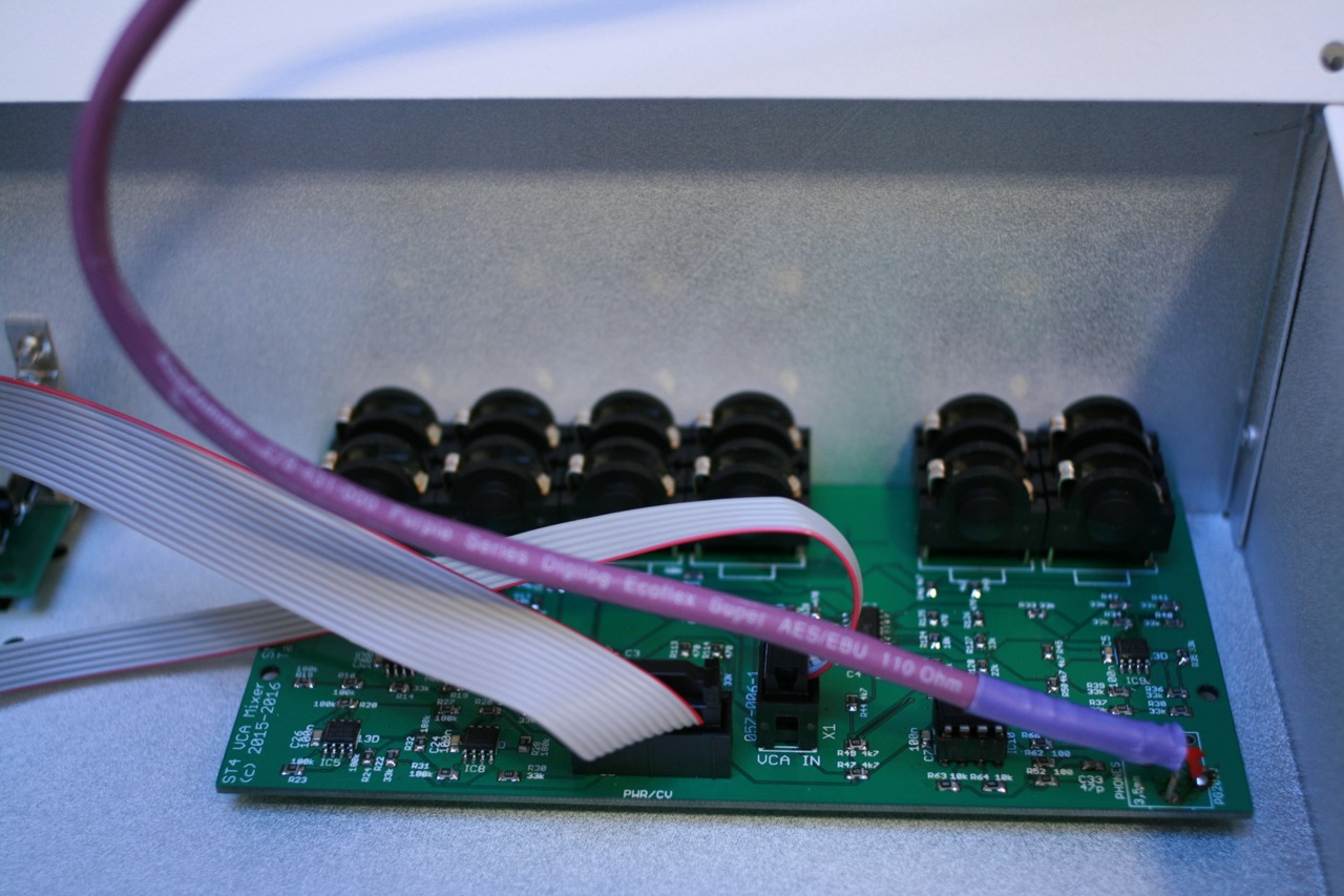The VCA board, fastened by its phono sockets. Suspended a few mm above the bottom.